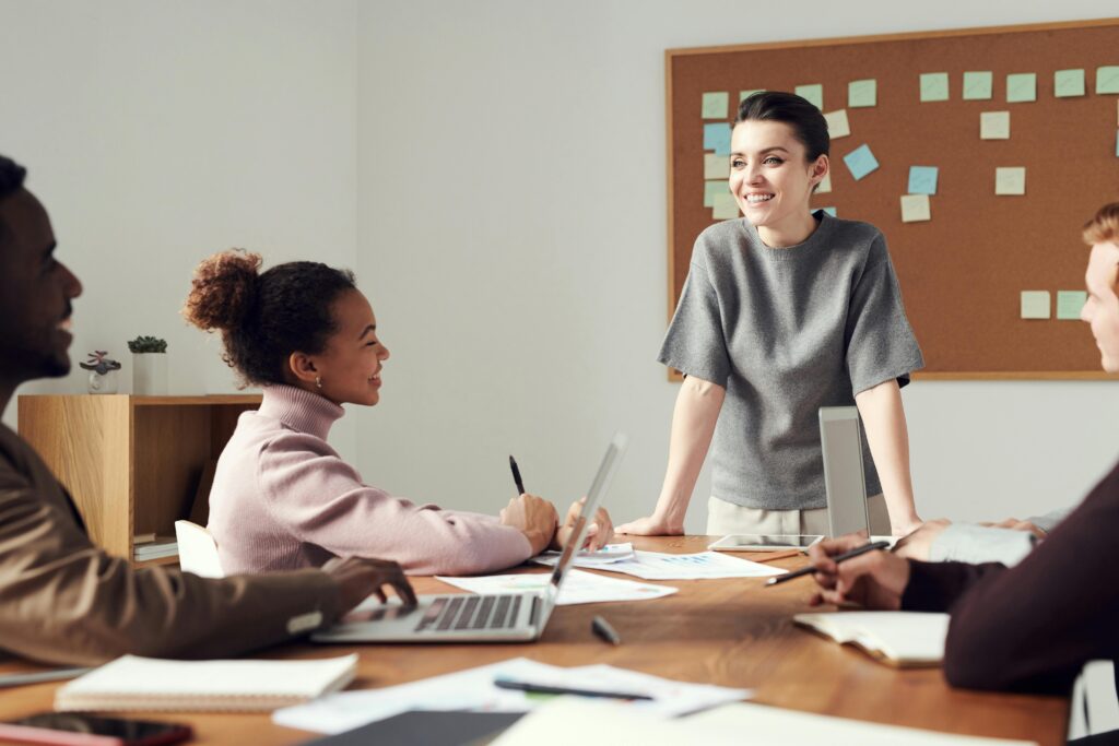 Woman leading in small business meeting